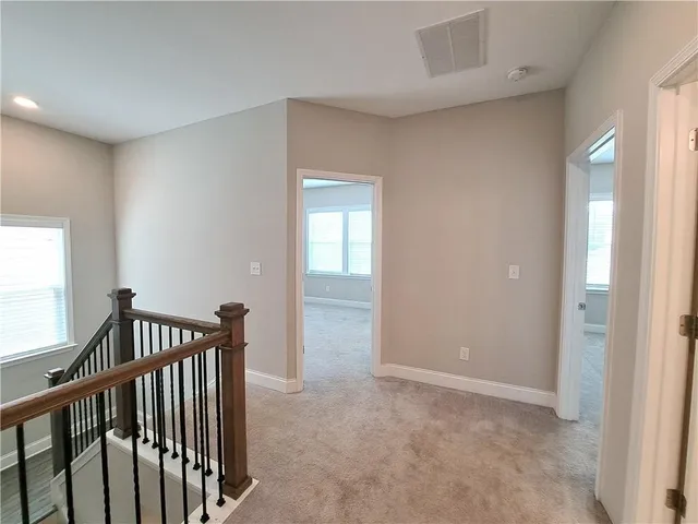 a view of hallway with bedroom