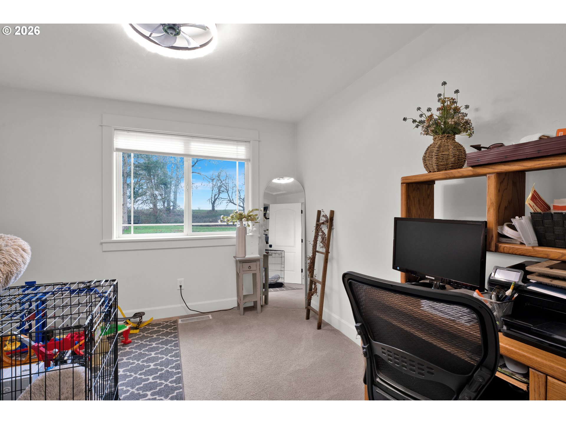 91606 Coburg Road Eugene, OR 97408 - Photo 13 of 30 a living room with furniture and a flat screen tv