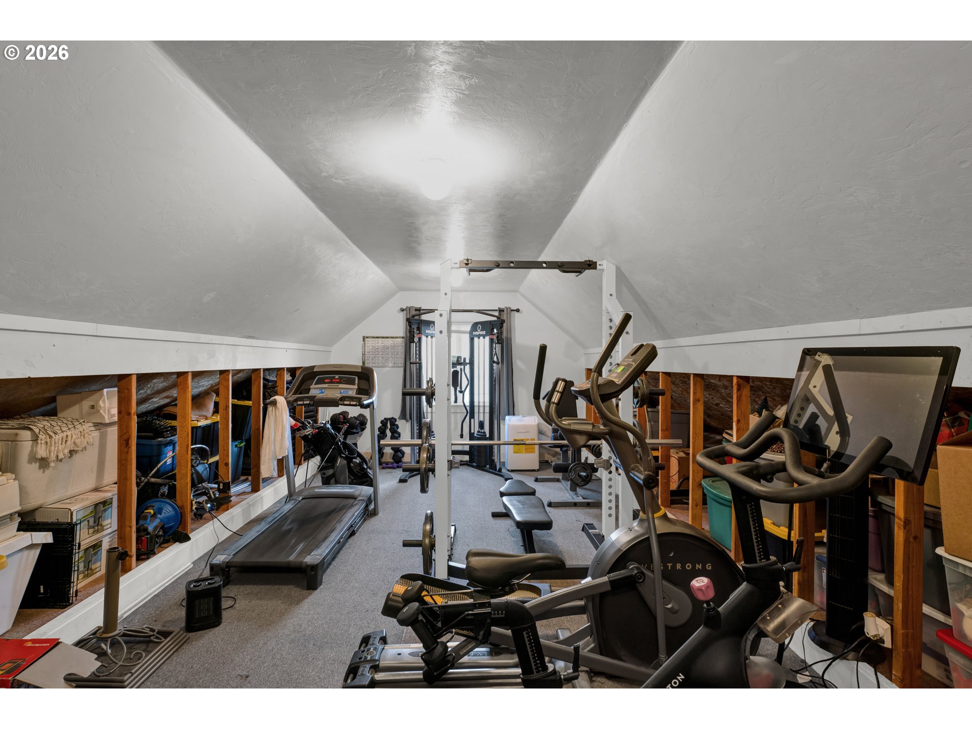 91606 Coburg Road Eugene, OR 97408 - Photo 22 of 30 a living room with lots of gym equipment