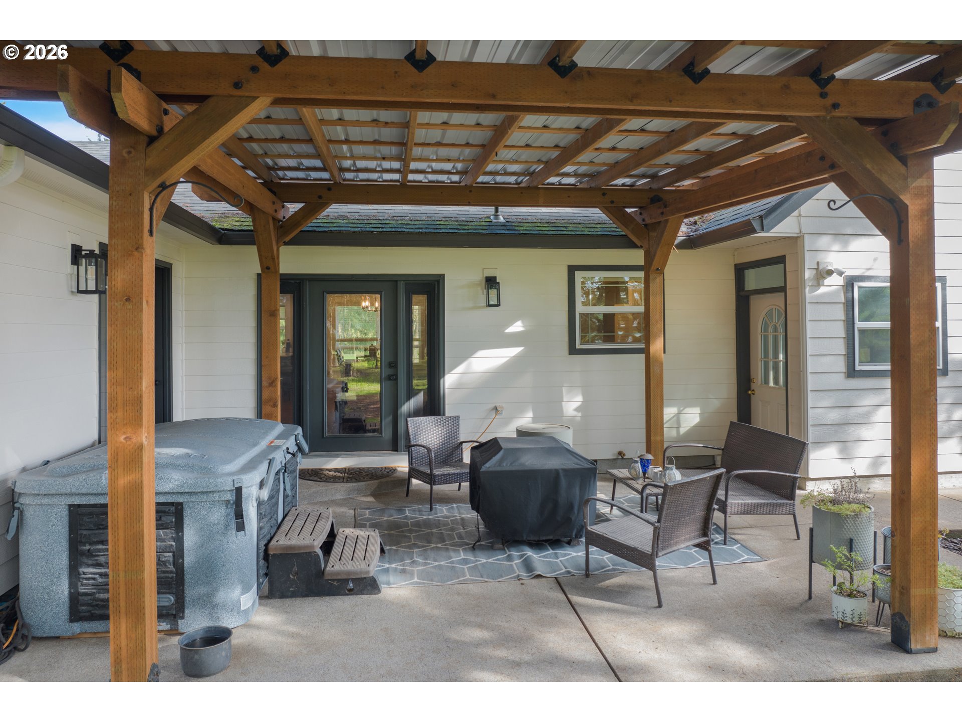 91606 Coburg Road Eugene, OR 97408 - Photo 27 of 30 a dining room with furniture and wooden floor