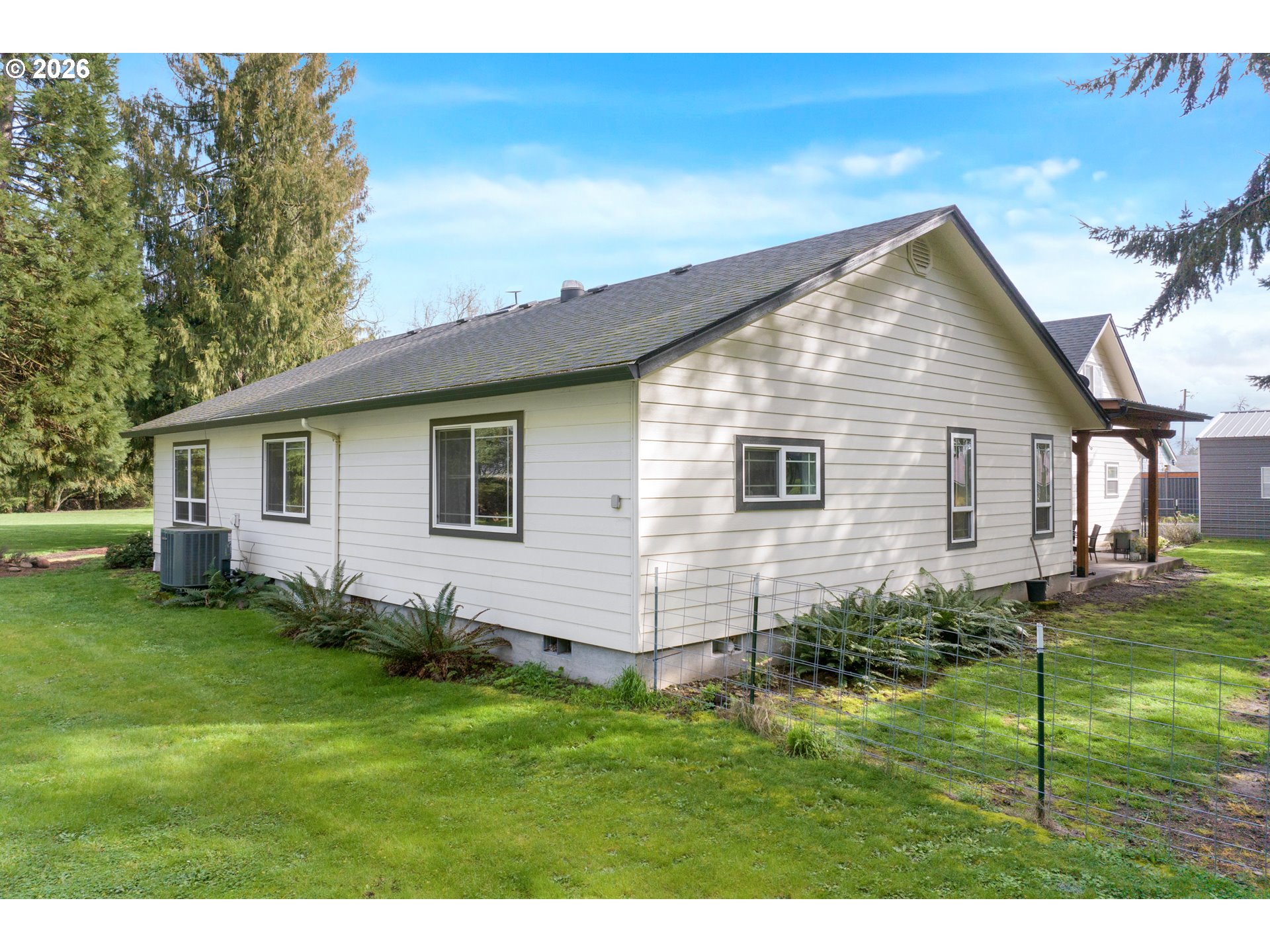 91606 Coburg Road Eugene, OR 97408 - Photo 28 of 30 a view of a house with a yard