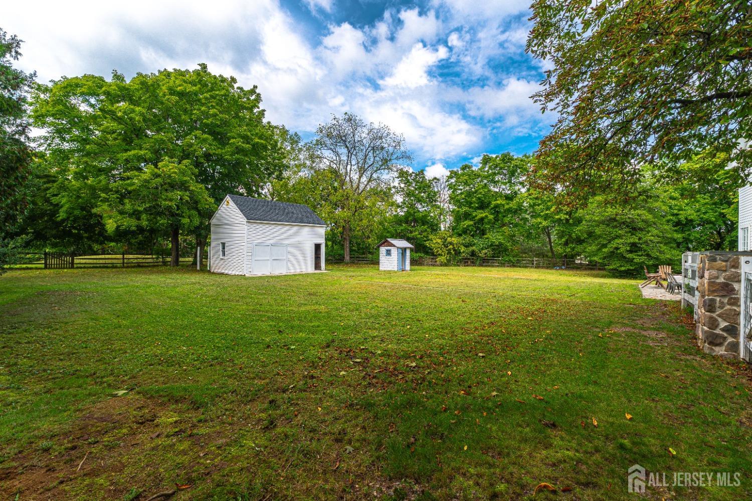 300 Blackpoint Road Neshanic Station, NJ 08853 - Photo 13 of 34 a house view with garden space