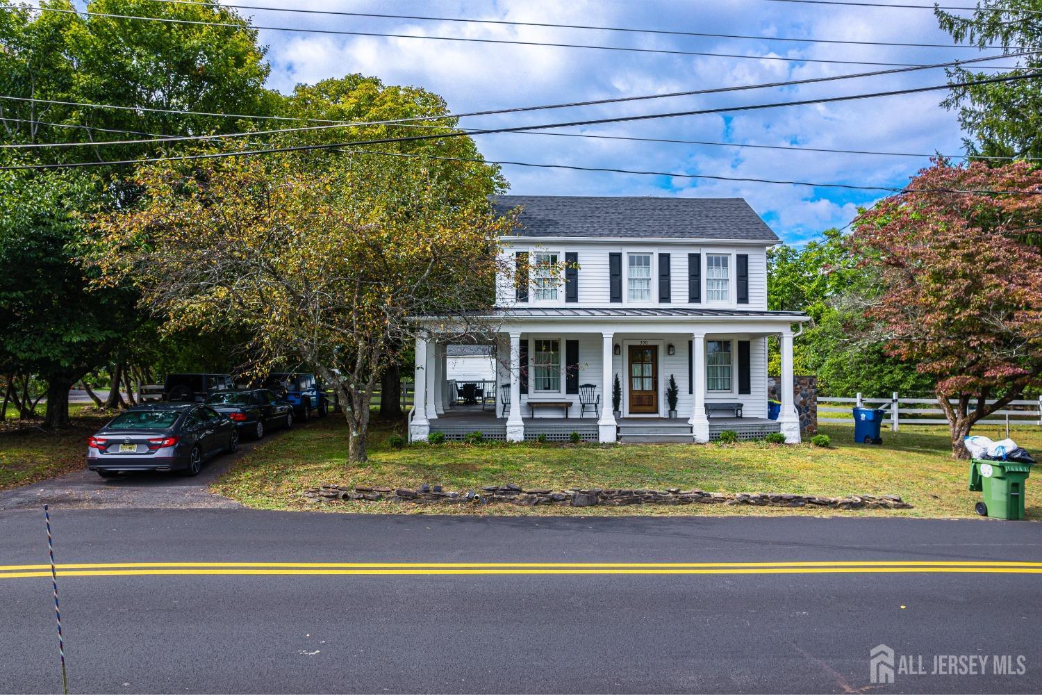 300 Blackpoint Road Neshanic Station, NJ 08853 - Photo 15 of 34 a view of swimming pool with lawn chairs and plants