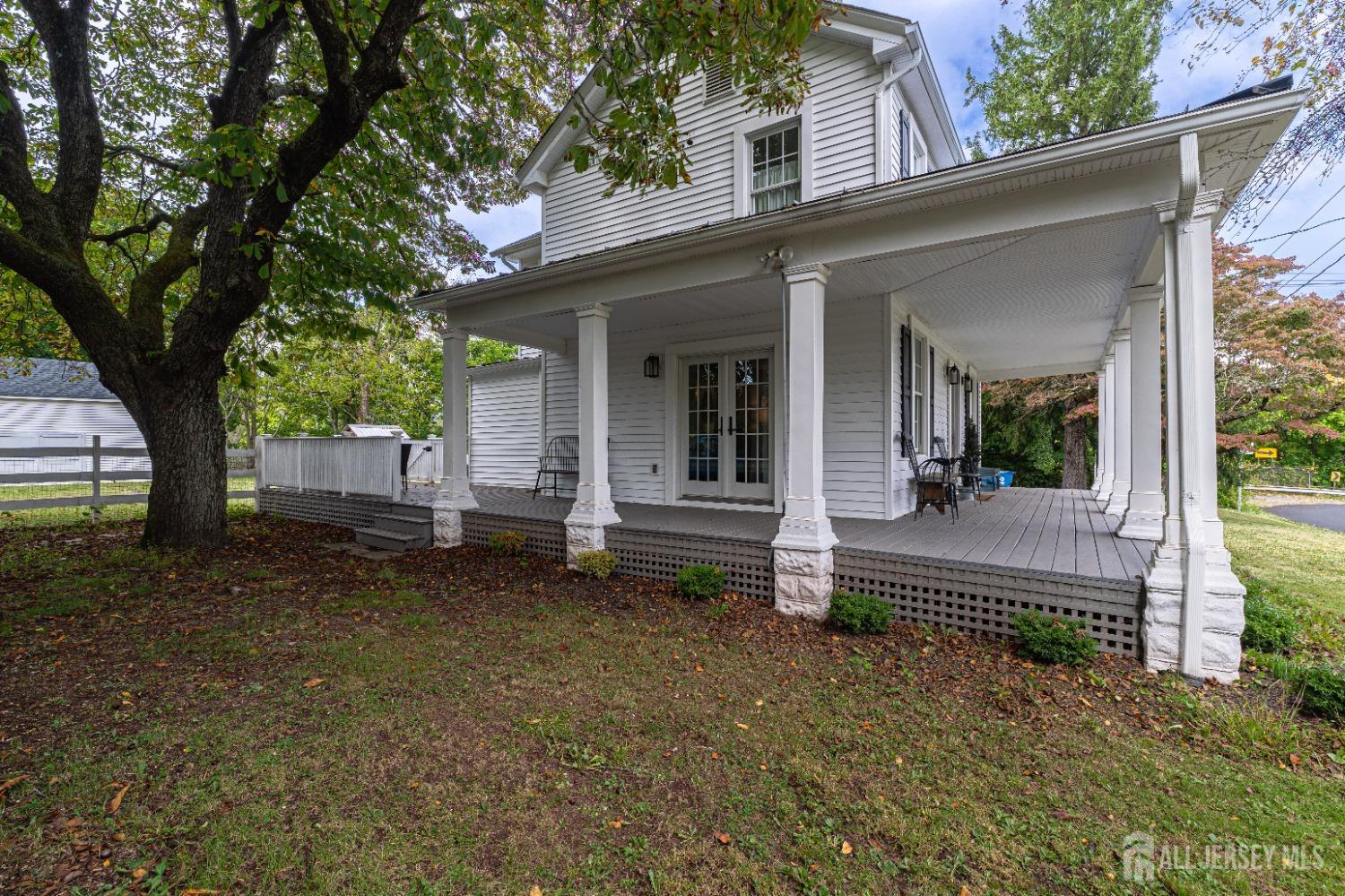 300 Blackpoint Road Neshanic Station, NJ 08853 - Photo 2 of 34 front view of a house with a yard