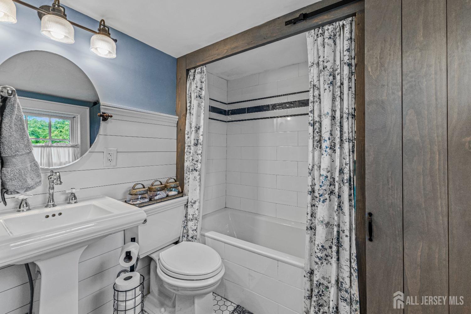 300 Blackpoint Road Neshanic Station, NJ 08853 - Photo 23 of 34 a bathroom with a sink toilet and shower