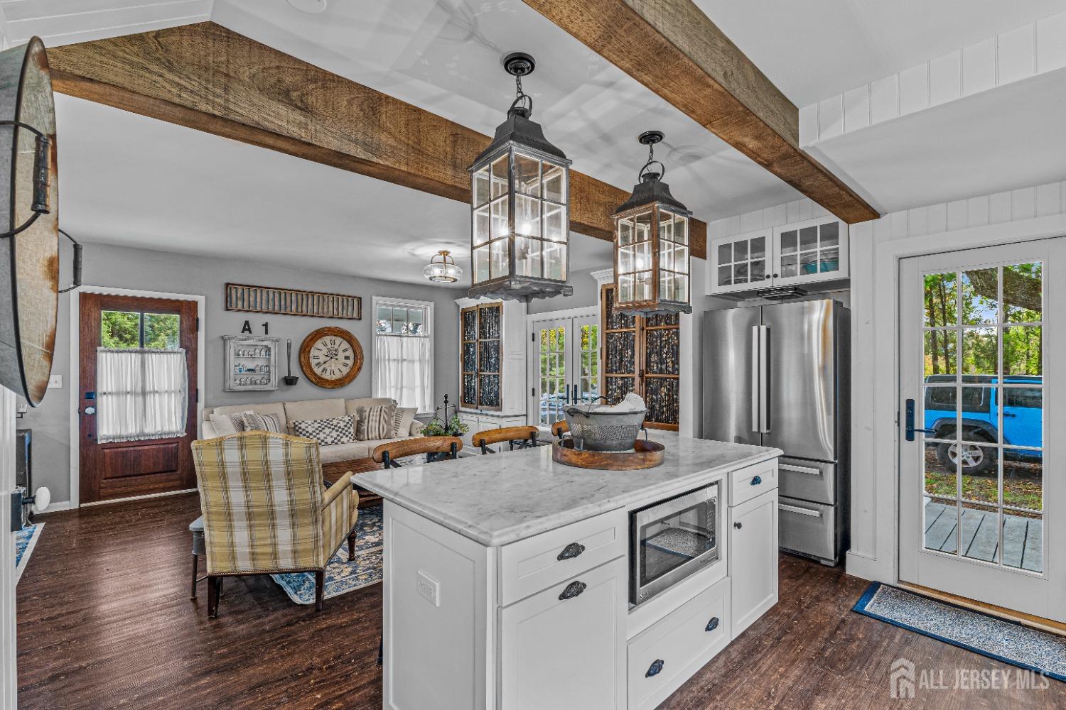 300 Blackpoint Road Neshanic Station, NJ 08853 - Photo 34 of 34 a living room with stainless steel appliances granite countertop a stove and a refrigerator