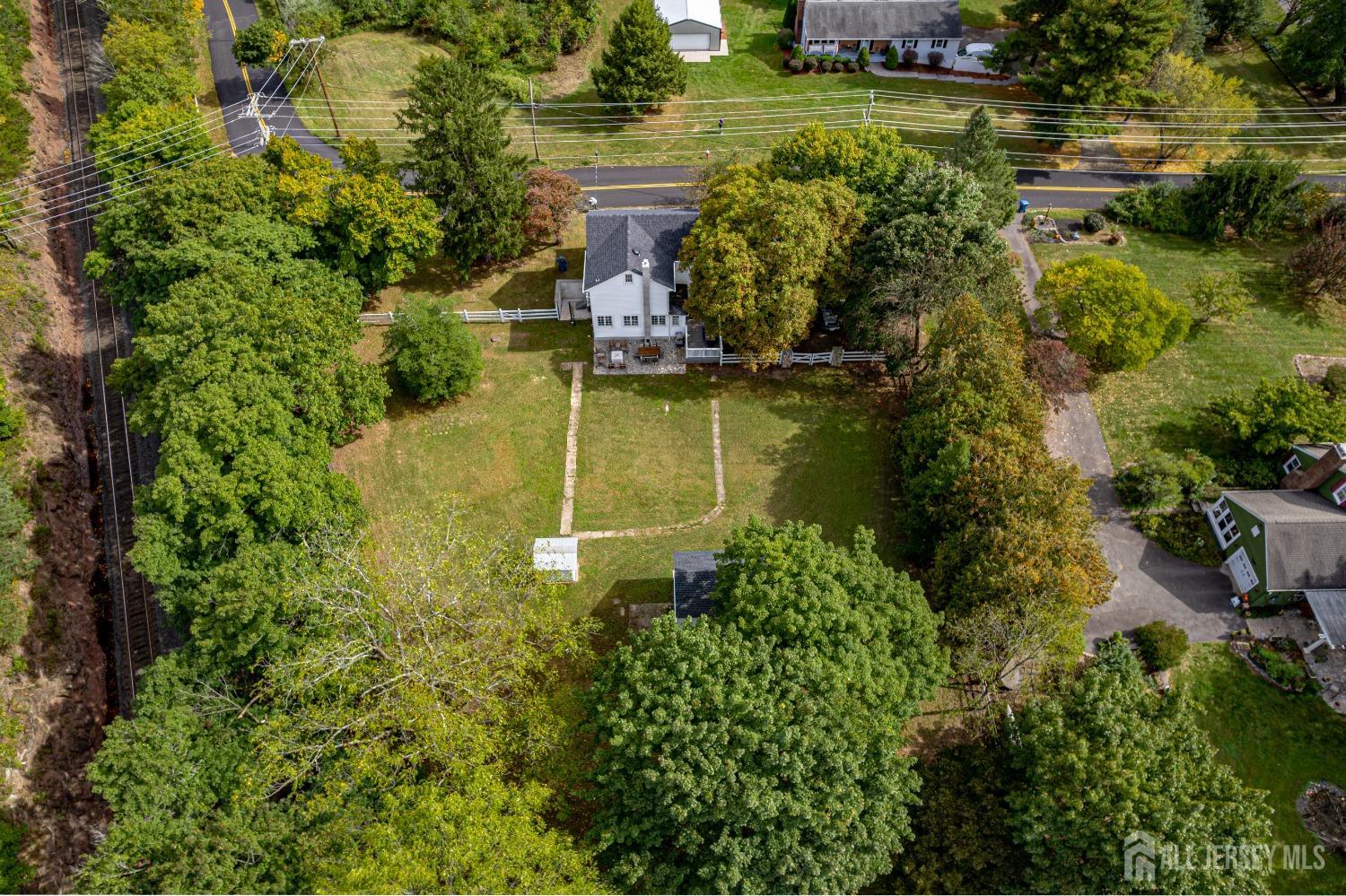 300 Blackpoint Road Neshanic Station, NJ 08853 - Photo 4 of 34 an aerial view of residential house with outdoor space and trees all around