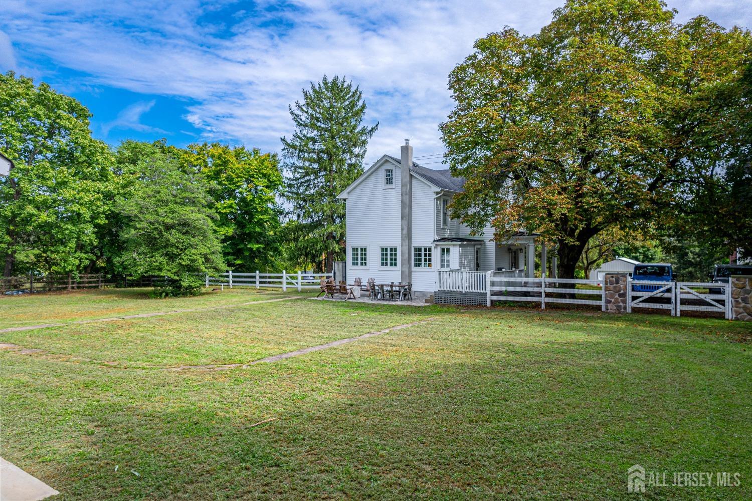 300 Blackpoint Road Neshanic Station, NJ 08853 - Photo 8 of 34 a view of a house with yard and sitting area