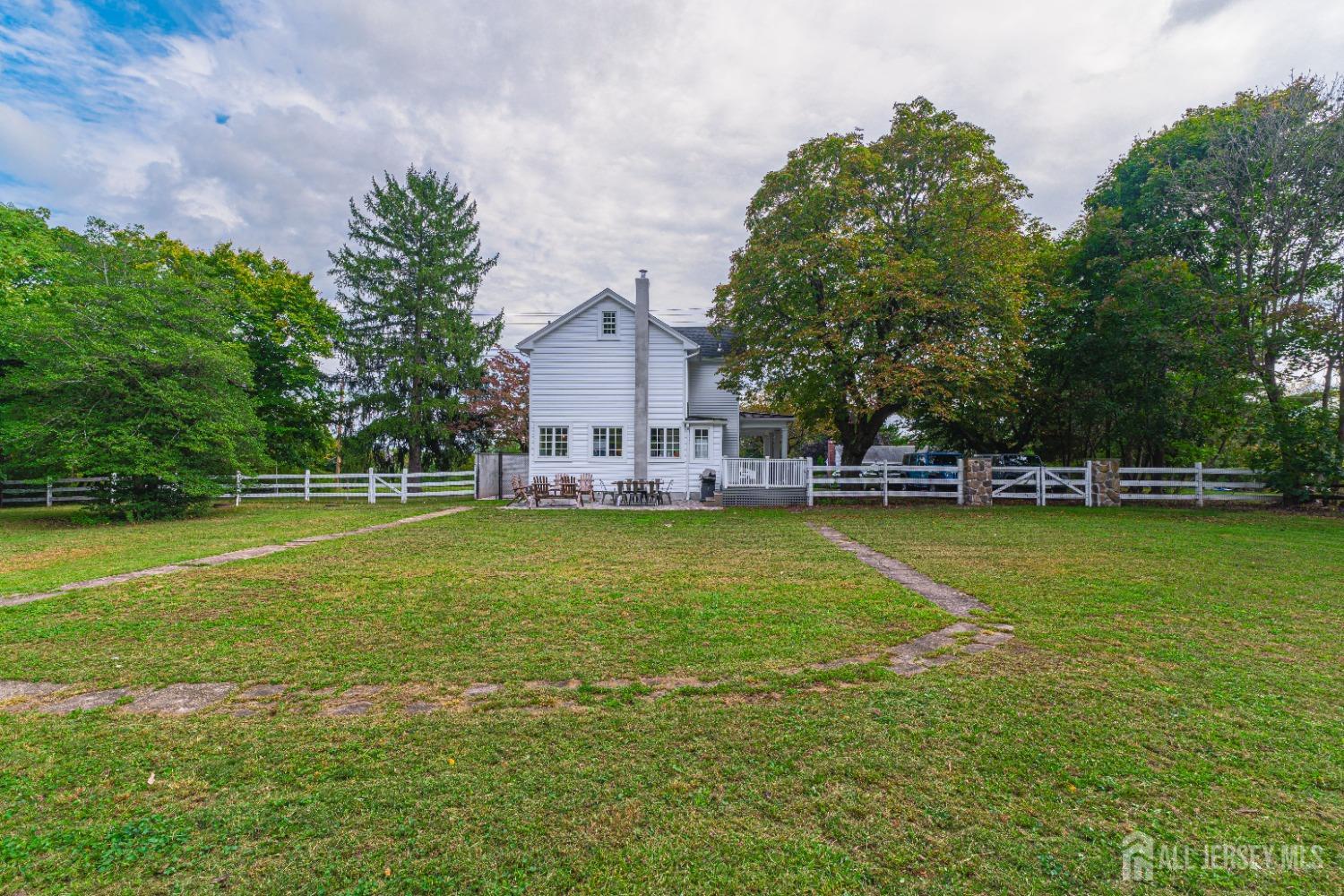 300 Blackpoint Road Neshanic Station, NJ 08853 - Photo 10 of 34 a view of a house with a swimming pool