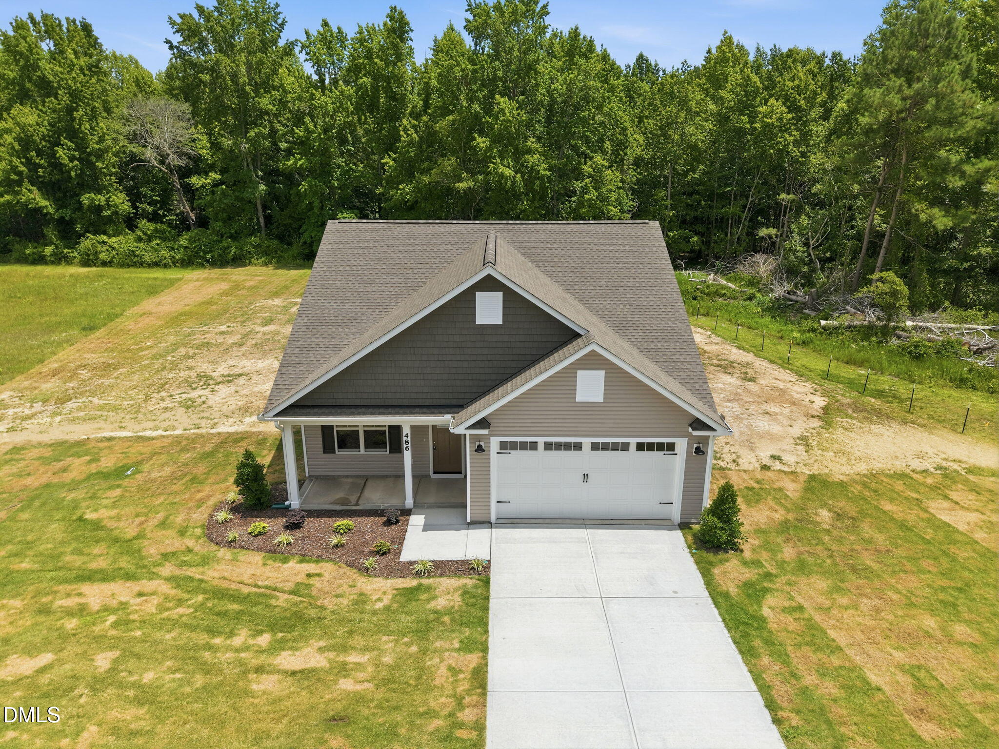 486 Sheriff Johnson Road Coats, NC 27521 - Photo 3 of 32 43-web-or-mls-DJI_20260709124754_0687_D