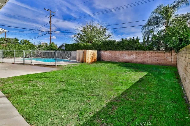 a view of a backyard with a garden