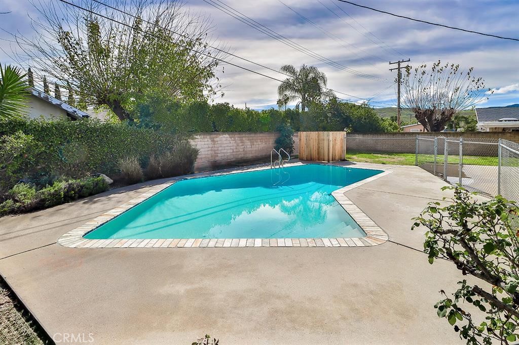 1870 Burch Avenue Simi Valley, CA 93063 - Photo 19 of 20 a view of backyard with swimming pool