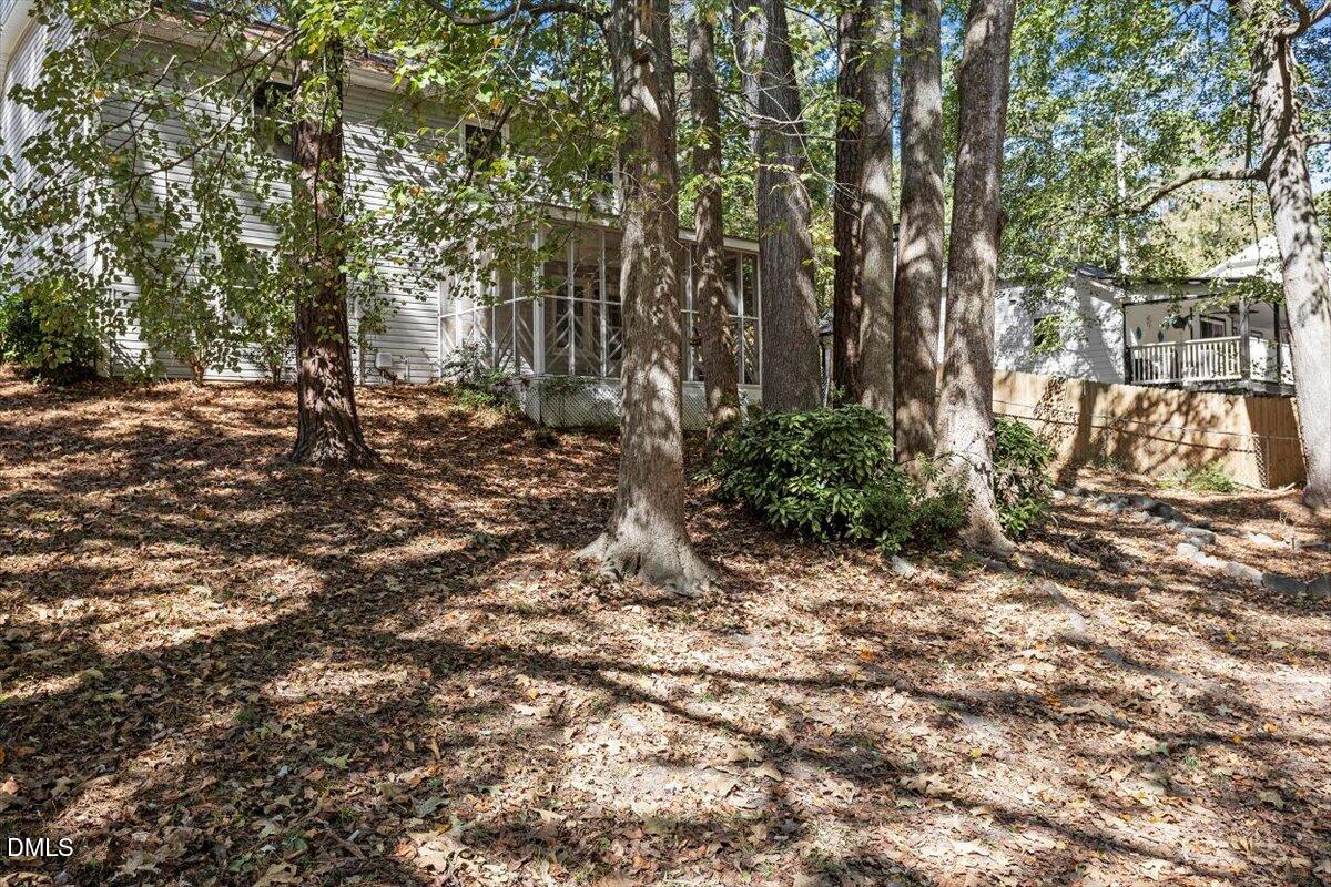 100 Brook Rock Lane Garner, NC 27529 - Photo 31 of 33 a view of a yard with plants and trees