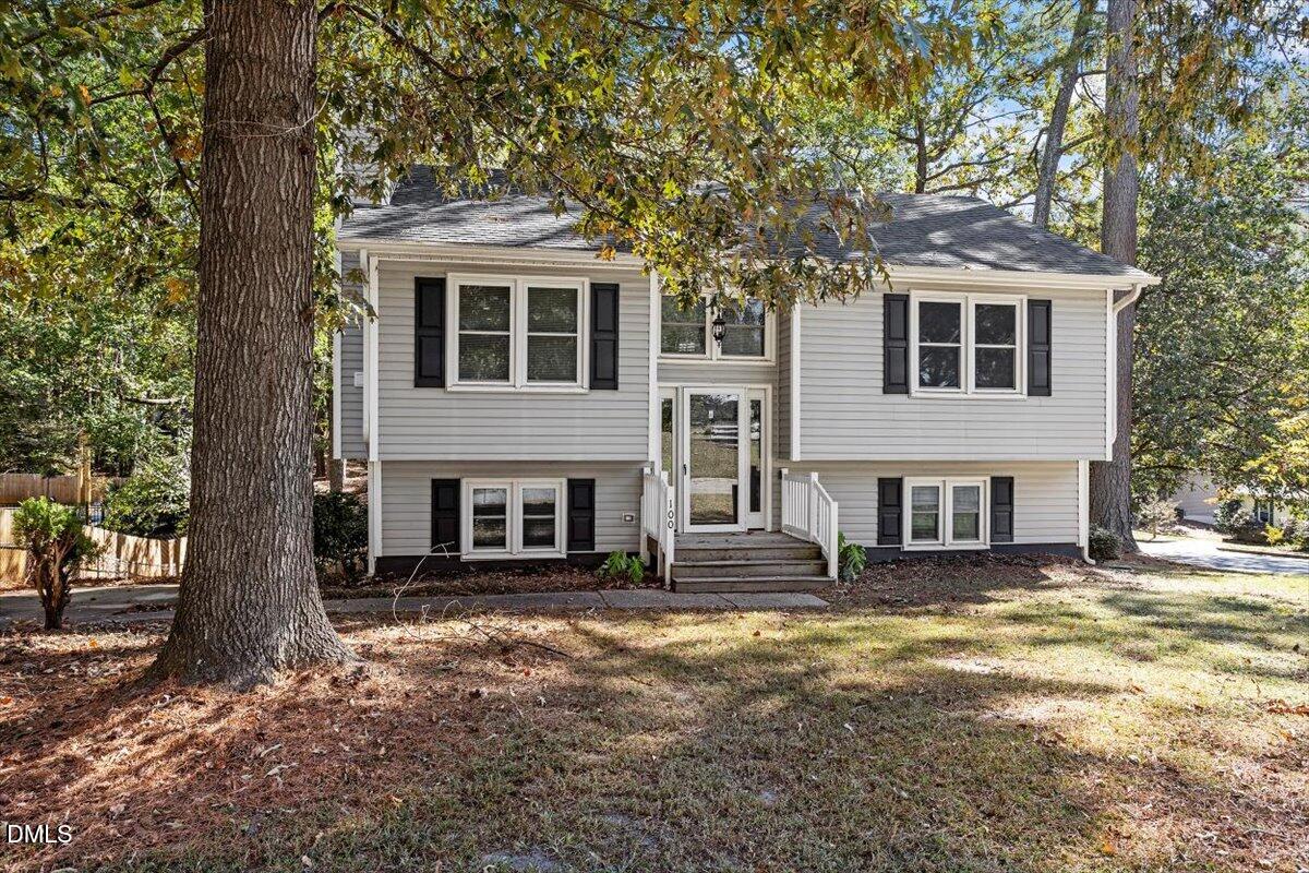100 Brook Rock Lane Garner, NC 27529 - Photo 5 of 33 a front view of a house with large trees