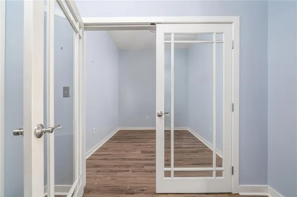 a view of a glass door with a glass door and a window