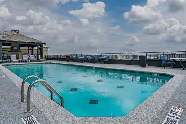 a view of a living room and a large window
