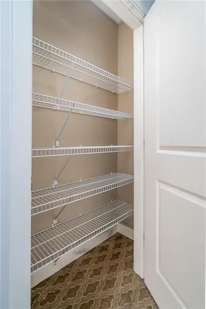 a bathroom with a granite countertop sink a toilet and bathtub