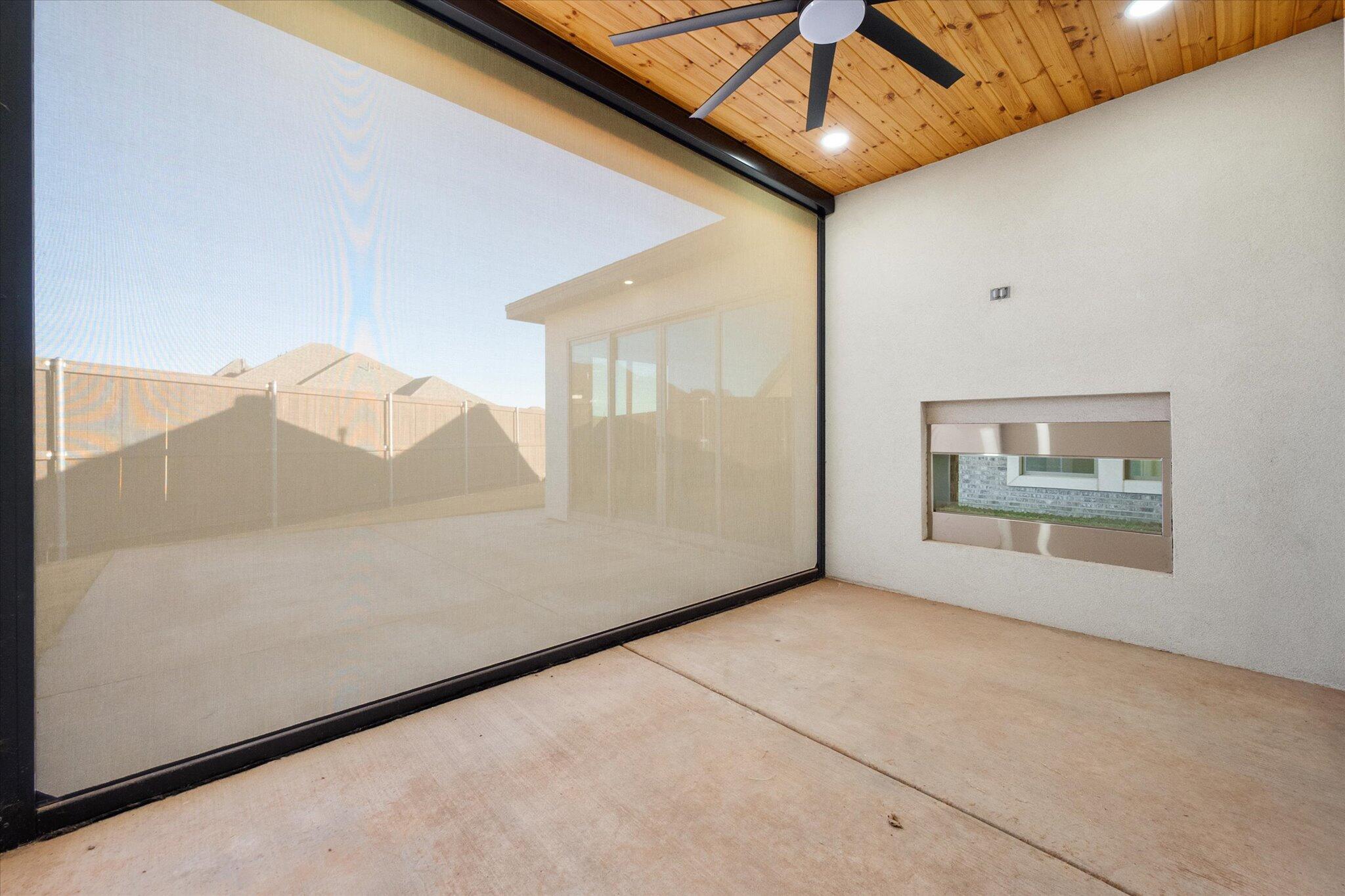 7516 57th Street Lubbock, TX 79407 - Photo 29 of 35 a view of an empty room with a window