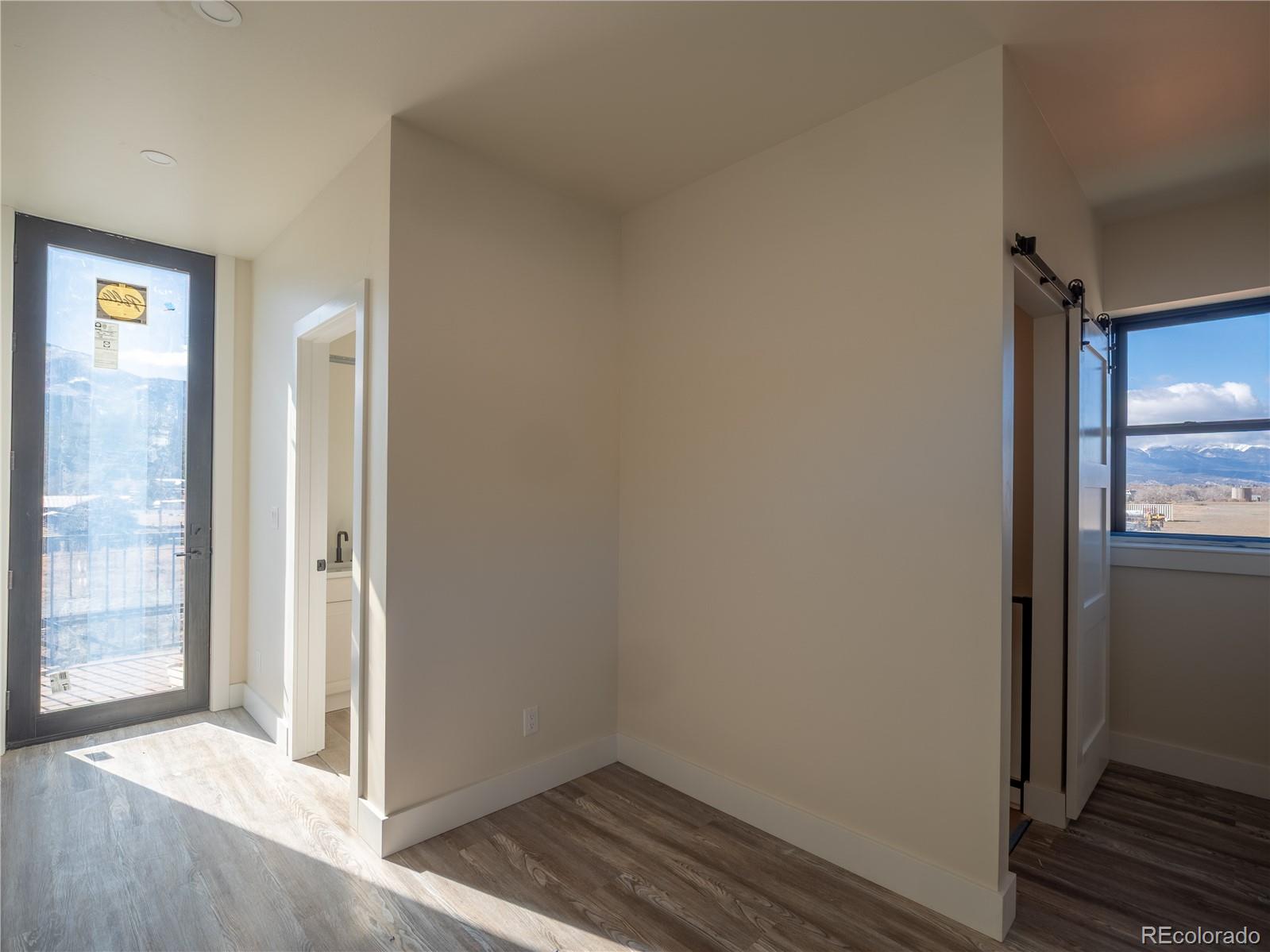 4901 Main Street Salida, CO 81201 - Photo 11 of 14 a view of hallway with wooden floor