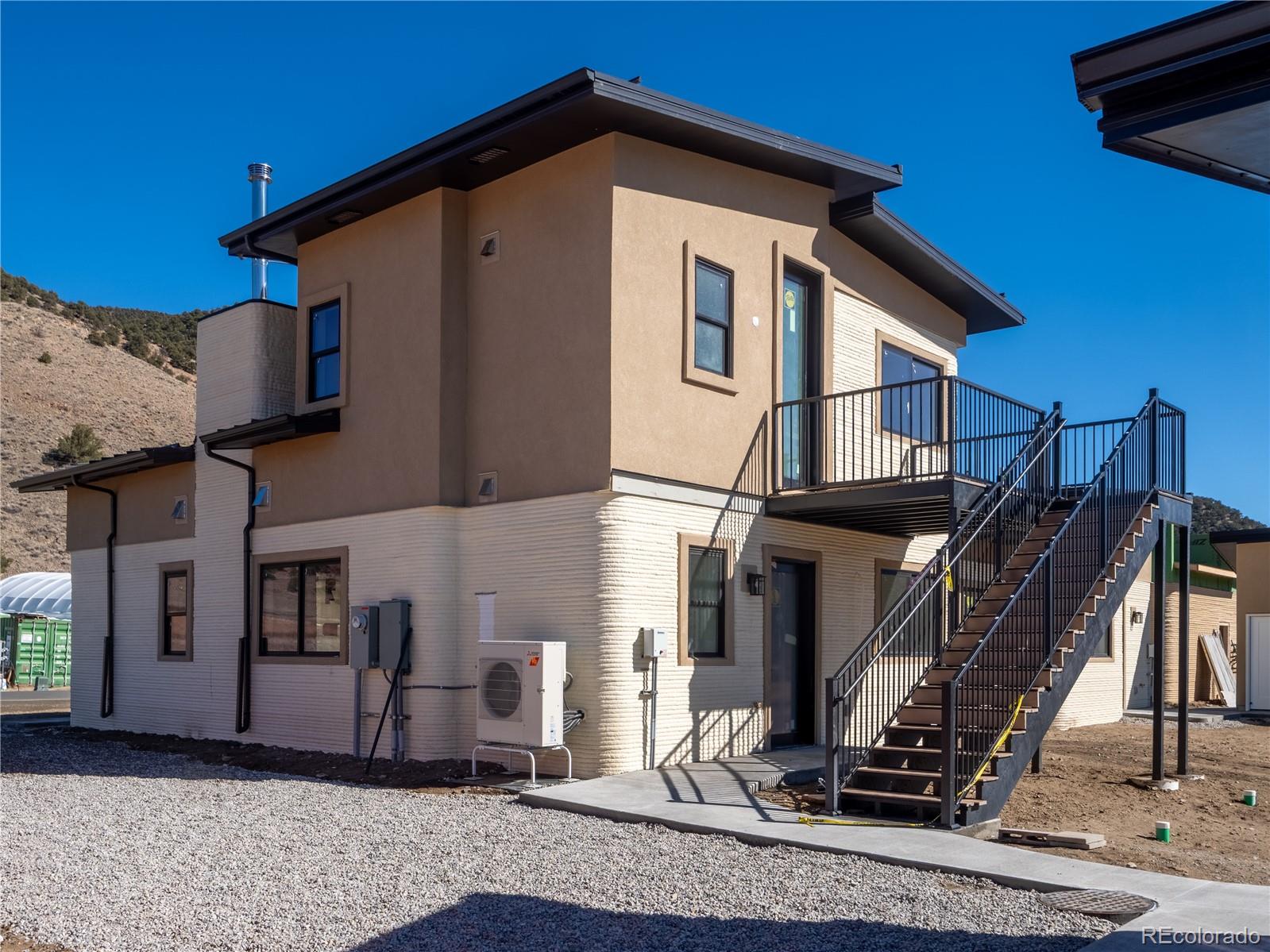 4901 Main Street Salida, CO 81201 - Photo 12 of 14 a front view of a house with stairway