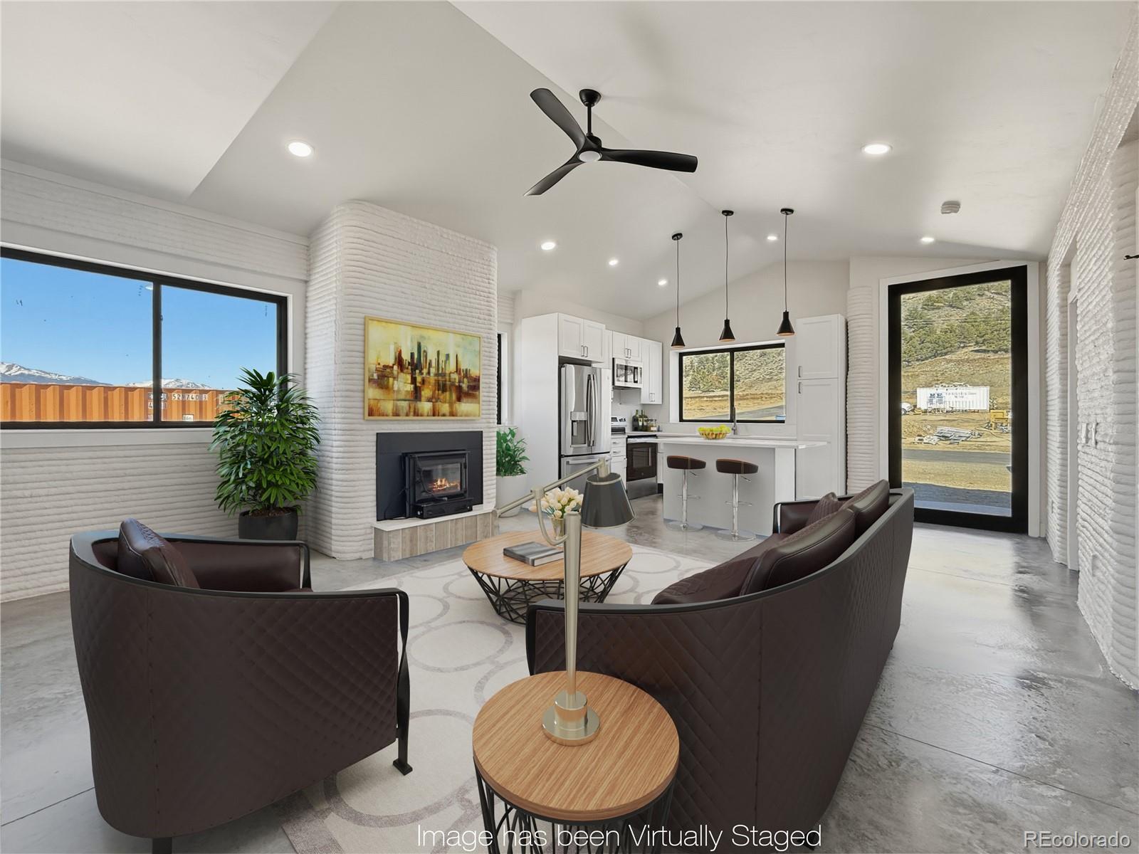 4901 Main Street Salida, CO 81201 - Photo 3 of 14 a living room with fireplace furniture and a large window