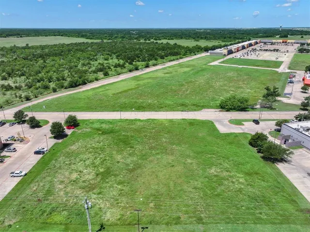 an aerial view of a house with a garden
