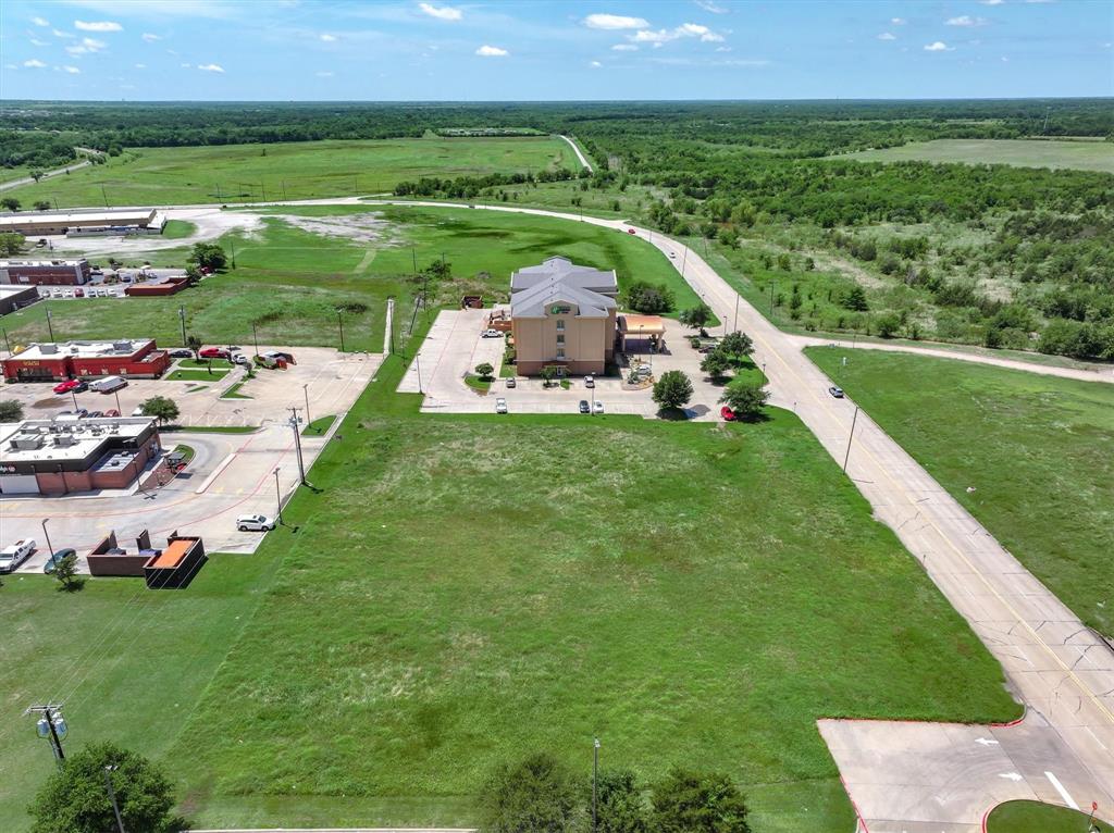 Tbd Tanger Drive Terrell, TX 75160 - Photo 13 of 16 a view of a garden with lawn chairs