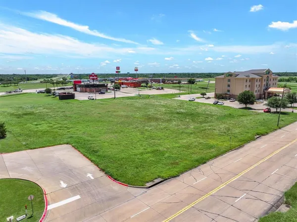 a view of a golf course with a lake