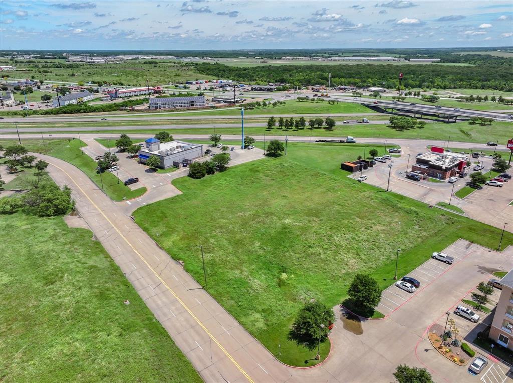 Tbd Tanger Drive Terrell, TX 75160 - Photo 7 of 16 a view of a golf course with a lake