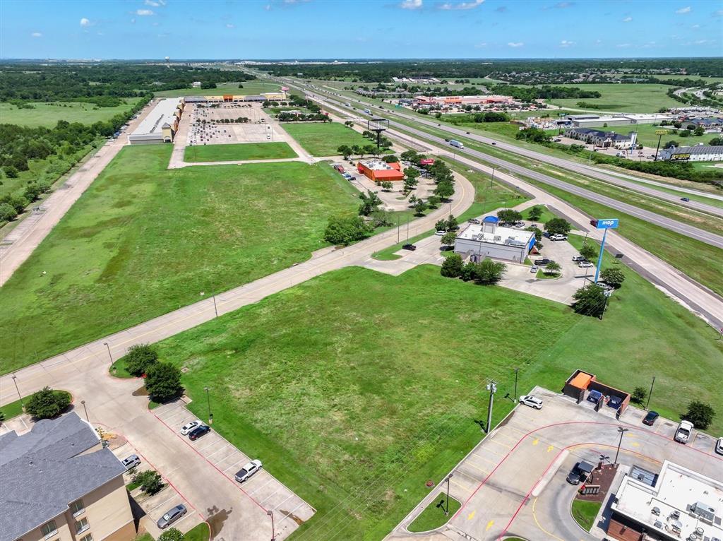 Tbd Tanger Drive Terrell, TX 75160 - Photo 8 of 16 an aerial view of a house with a garden and lake view