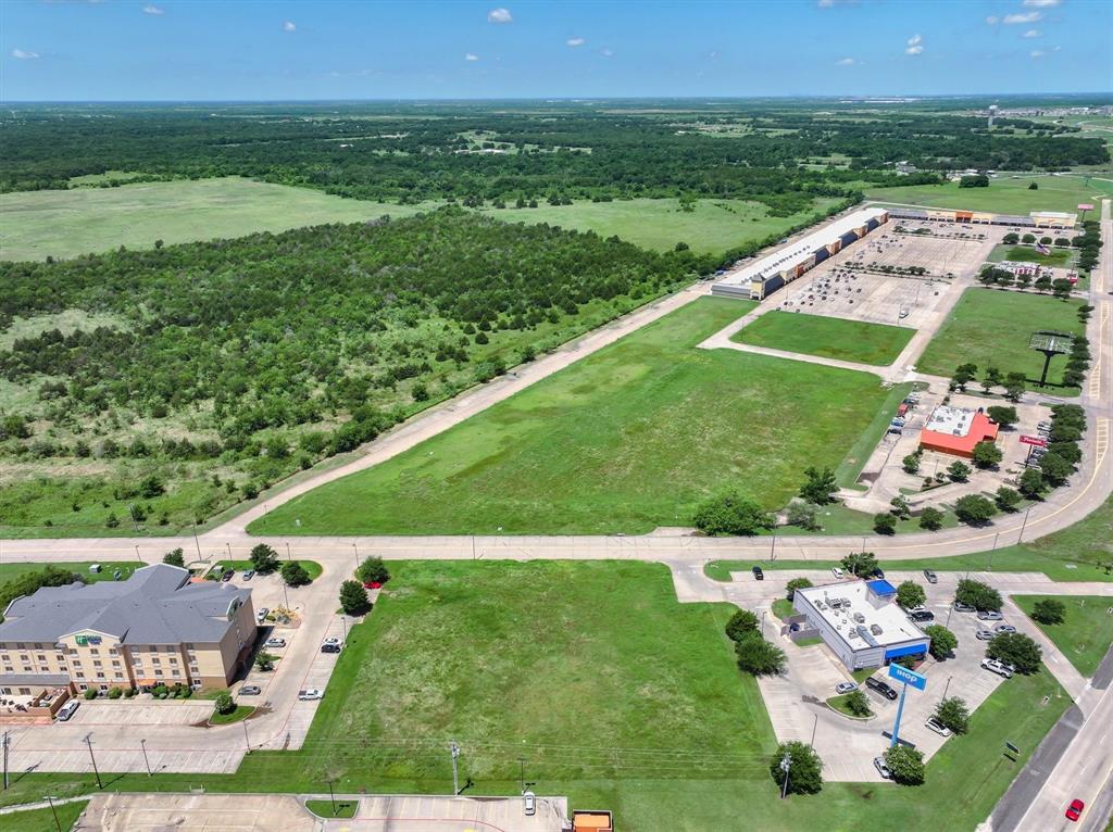 Tbd Tanger Drive Terrell, TX 75160 - Photo 10 of 16 an aerial view of residential houses with outdoor space and trees