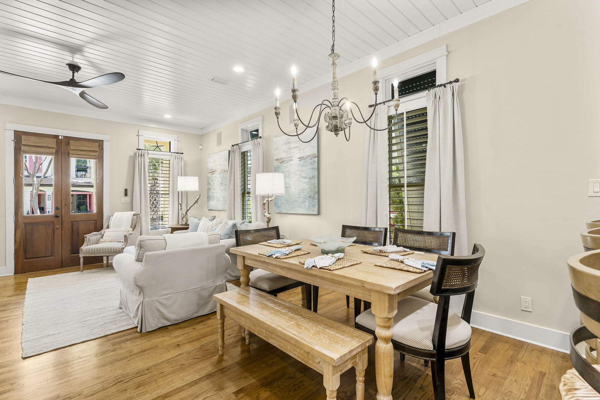 60 Rue Caribe Miramar Beach, FL 32550 - Photo 11 of 43 a view of a a dining room with furniture window and wooden floor