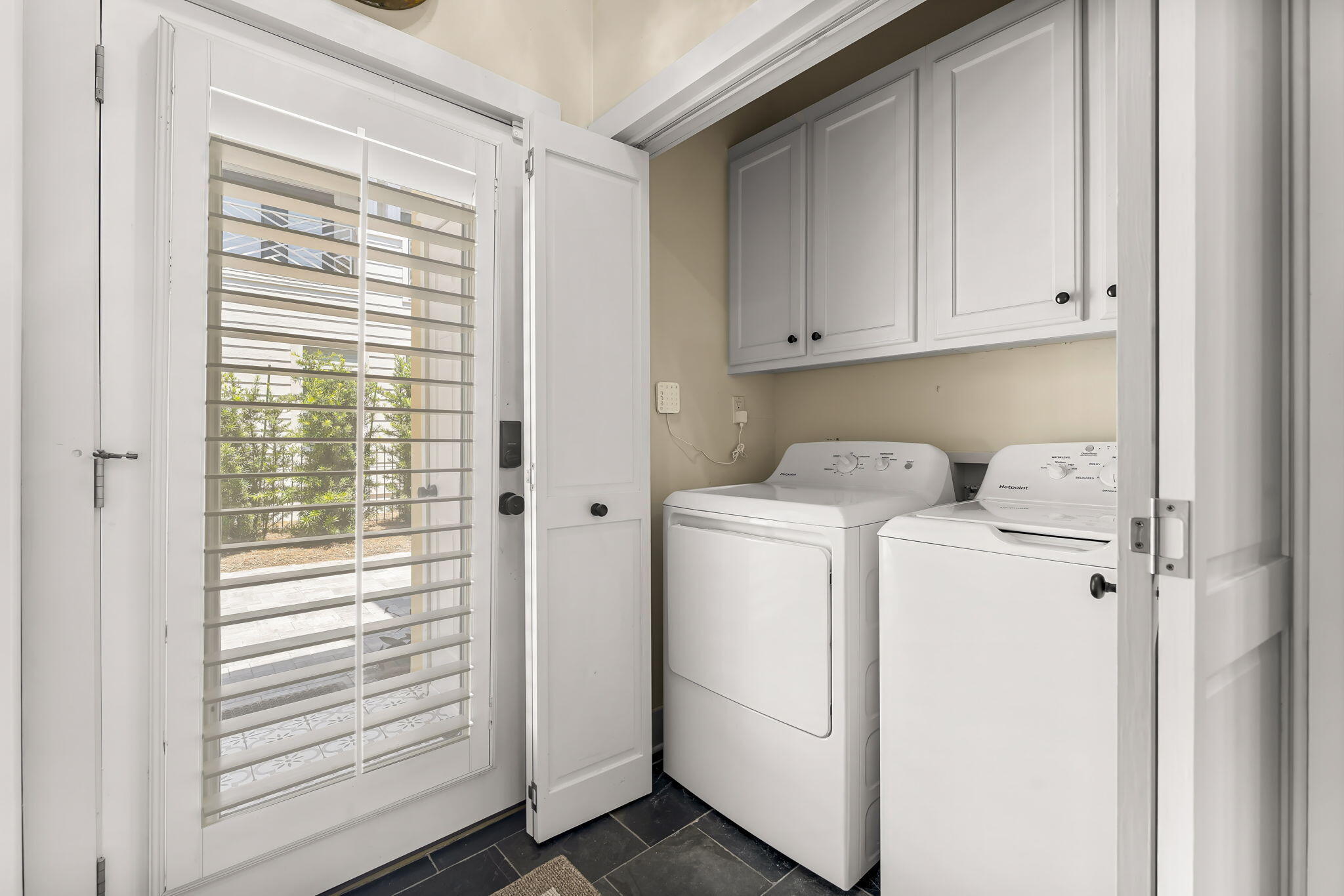 60 Rue Caribe Miramar Beach, FL 32550 - Photo 15 of 43 a utility room with dryer and washer