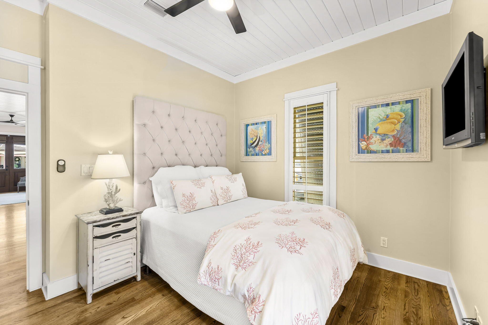 60 Rue Caribe Miramar Beach, FL 32550 - Photo 17 of 43 a bedroom with a bed and a painting on the wall