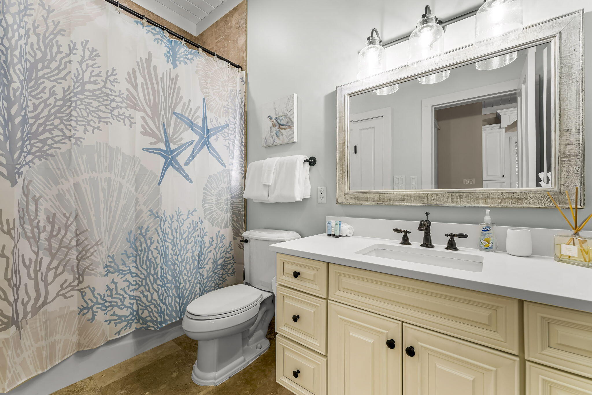 60 Rue Caribe Miramar Beach, FL 32550 - Photo 18 of 43 a bathroom with a granite countertop sink a toilet and a mirror
