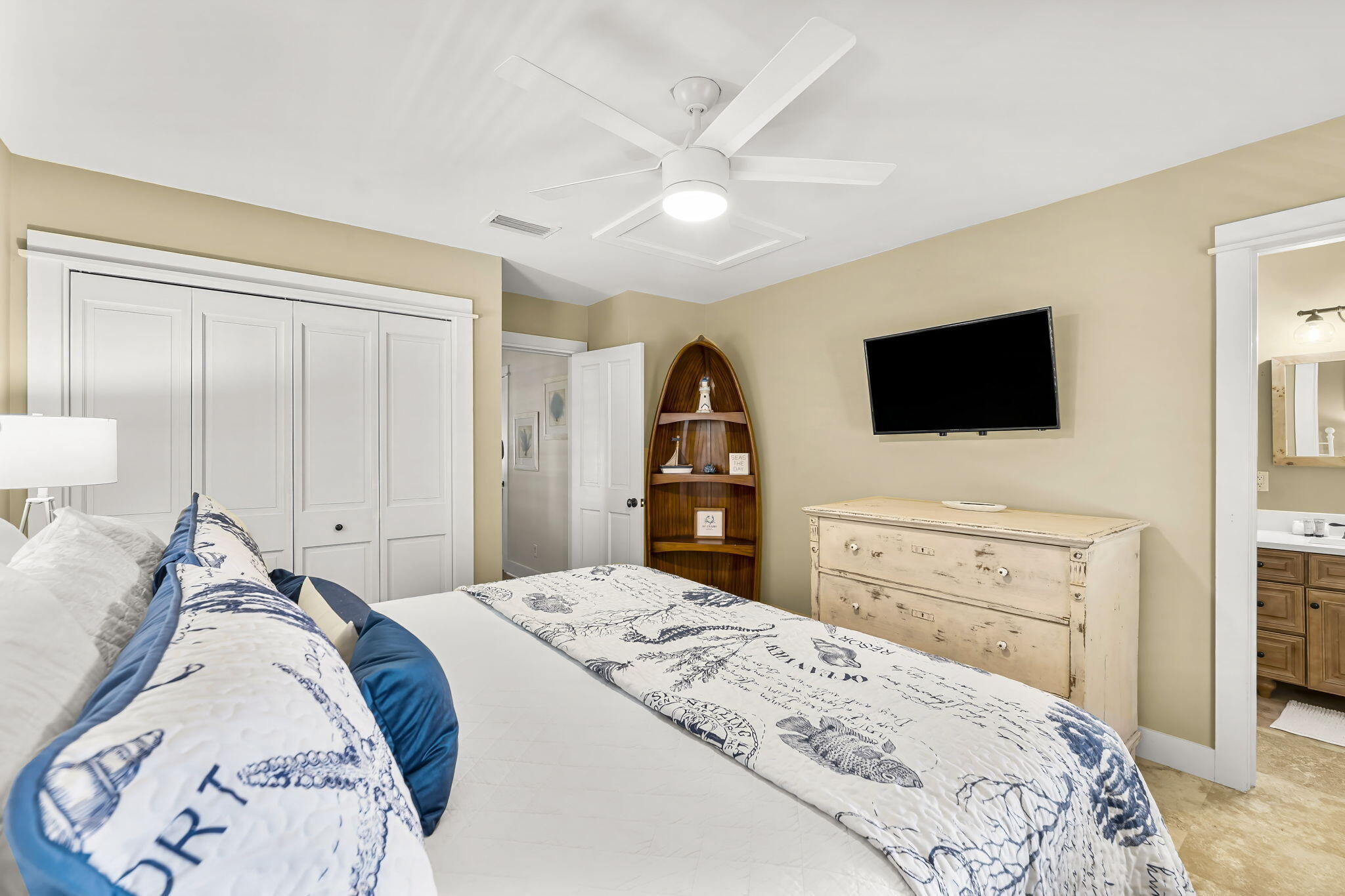 60 Rue Caribe Miramar Beach, FL 32550 - Photo 26 of 43 a bedroom with a bed and a flat screen tv