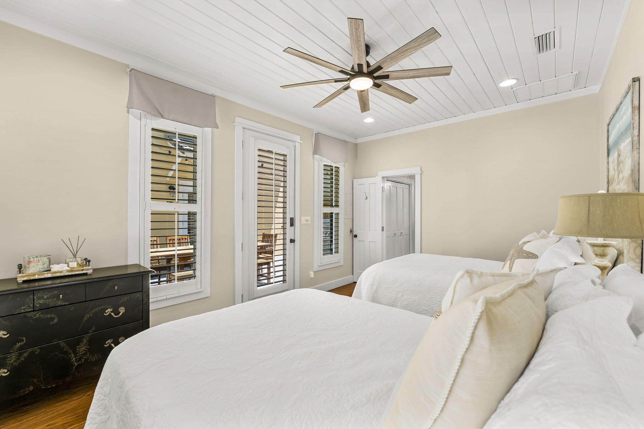 60 Rue Caribe Miramar Beach, FL 32550 - Photo 30 of 43 a bedroom with a large bed and a window