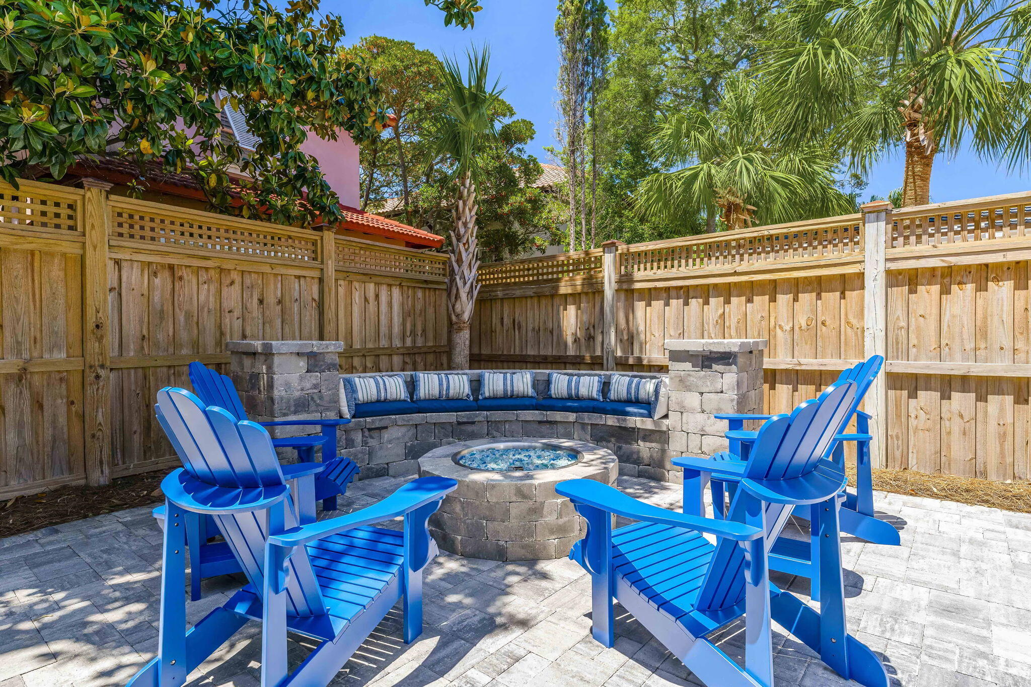 60 Rue Caribe Miramar Beach, FL 32550 - Photo 36 of 43 a blue swimming pool with outdoor seating and barbeque oven