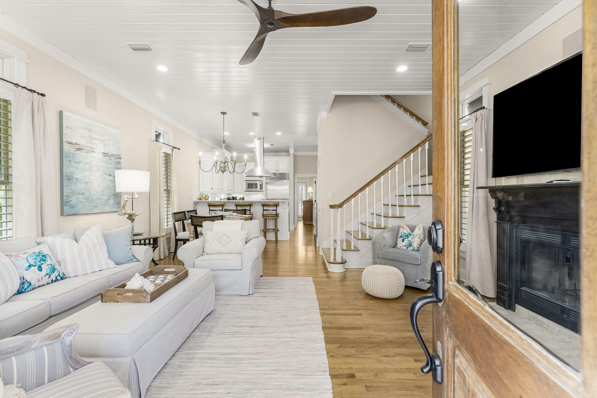 60 Rue Caribe Miramar Beach, FL 32550 - Photo 6 of 43 a living room with furniture and a flat screen tv