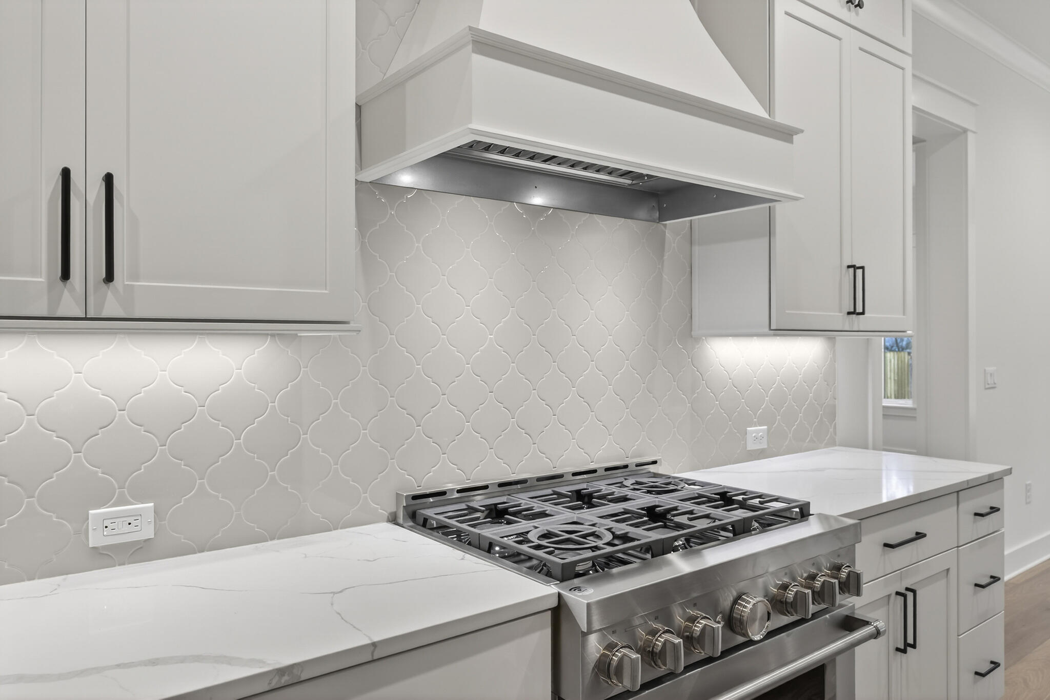 453 Shimmer Circle Freeport, FL 32439 - Photo 15 of 38 a stove top oven sitting inside of a kitchen