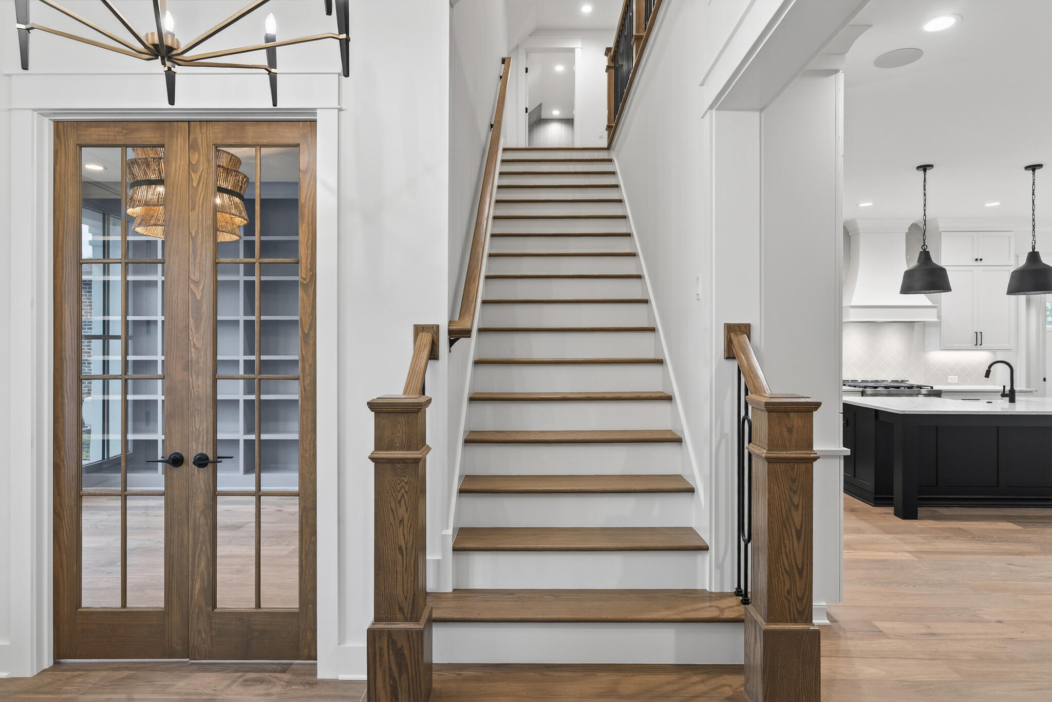 453 Shimmer Circle Freeport, FL 32439 - Photo 21 of 38 a view of a living room with wooden floor and stairs