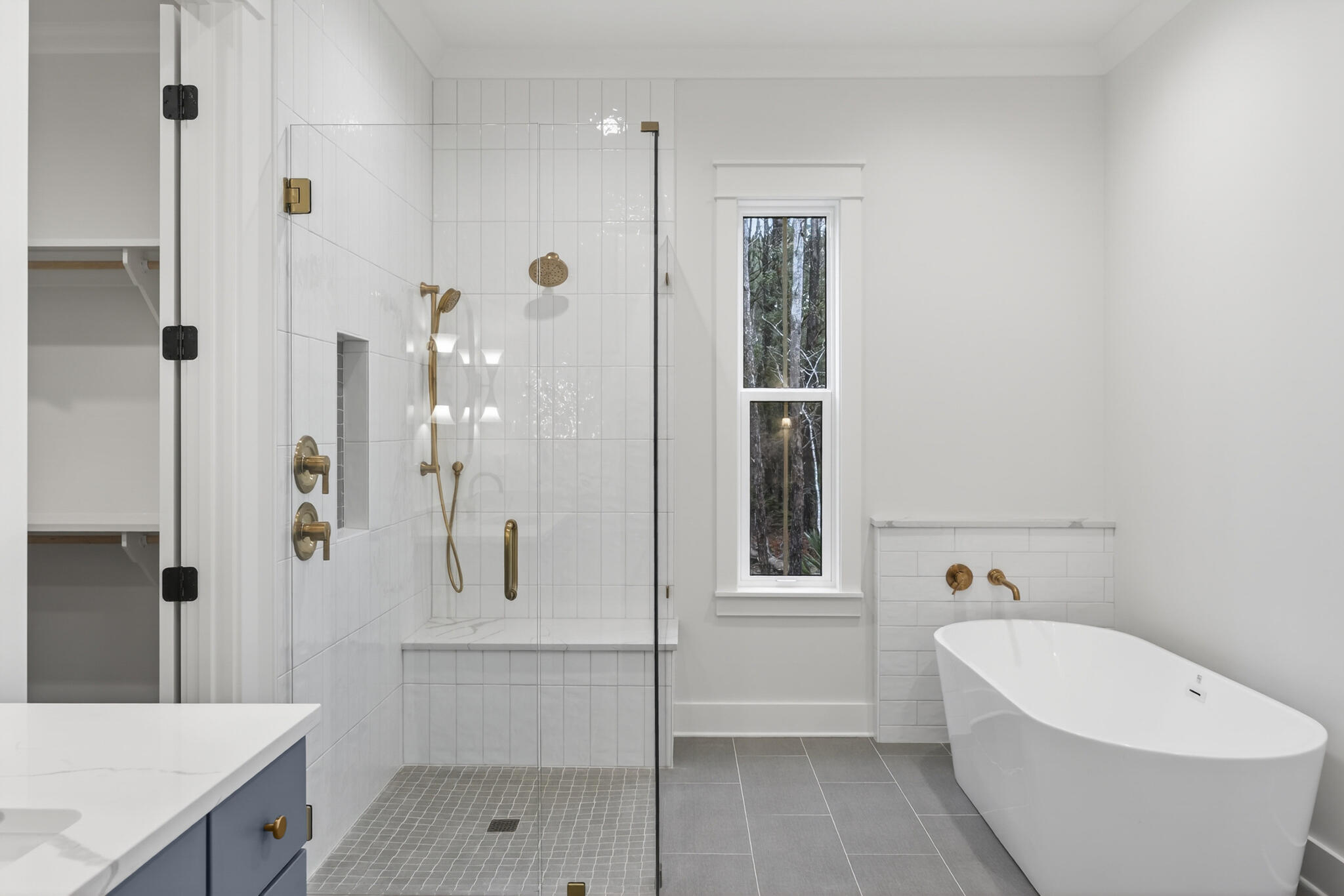 453 Shimmer Circle Freeport, FL 32439 - Photo 24 of 38 a bathroom with a tub shower and sink