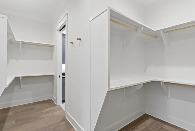 a view of an empty walk in closet