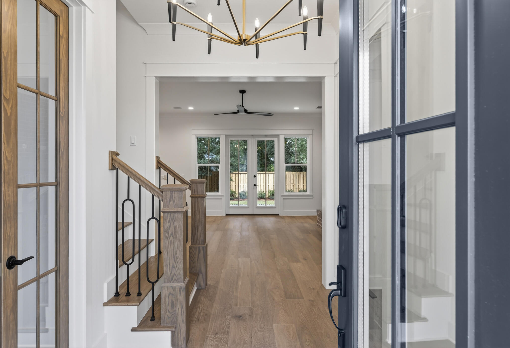 453 Shimmer Circle Freeport, FL 32439 - Photo 3 of 38 a view of entryway and hall with wooden floor