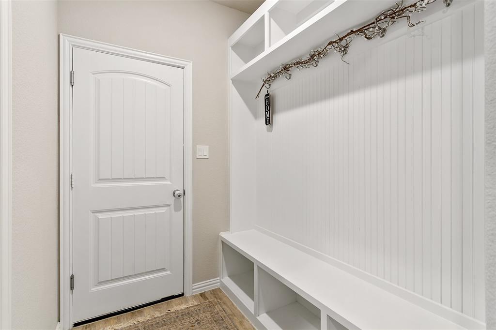 129 Cooper Court Springtown, TX 76082 - Photo 24 of 27 Mudroom featuring hardwood / wood-style floors