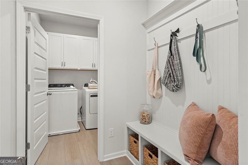 105 Roy Drive Calhoun, GA 30701 - Photo 3 of 28 a view of walk in closet with clothes and shoes
