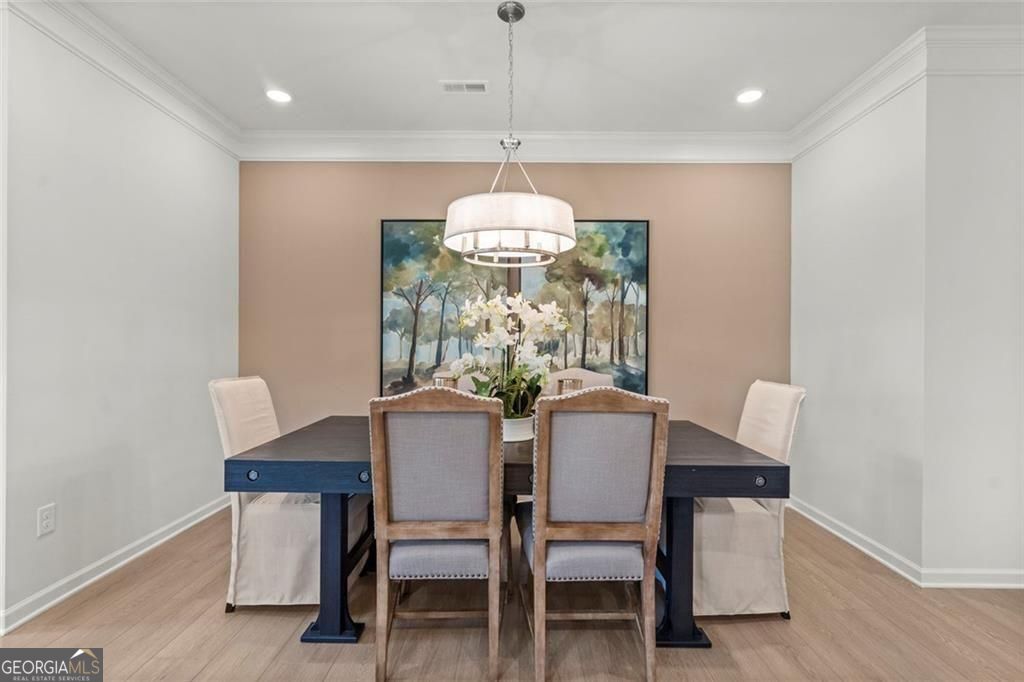 105 Roy Drive Calhoun, GA 30701 - Photo 7 of 28 a dining room with furniture and window
