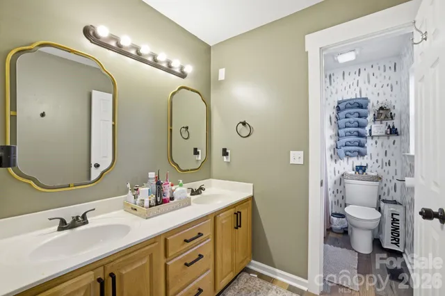 a bedroom with bed and a window