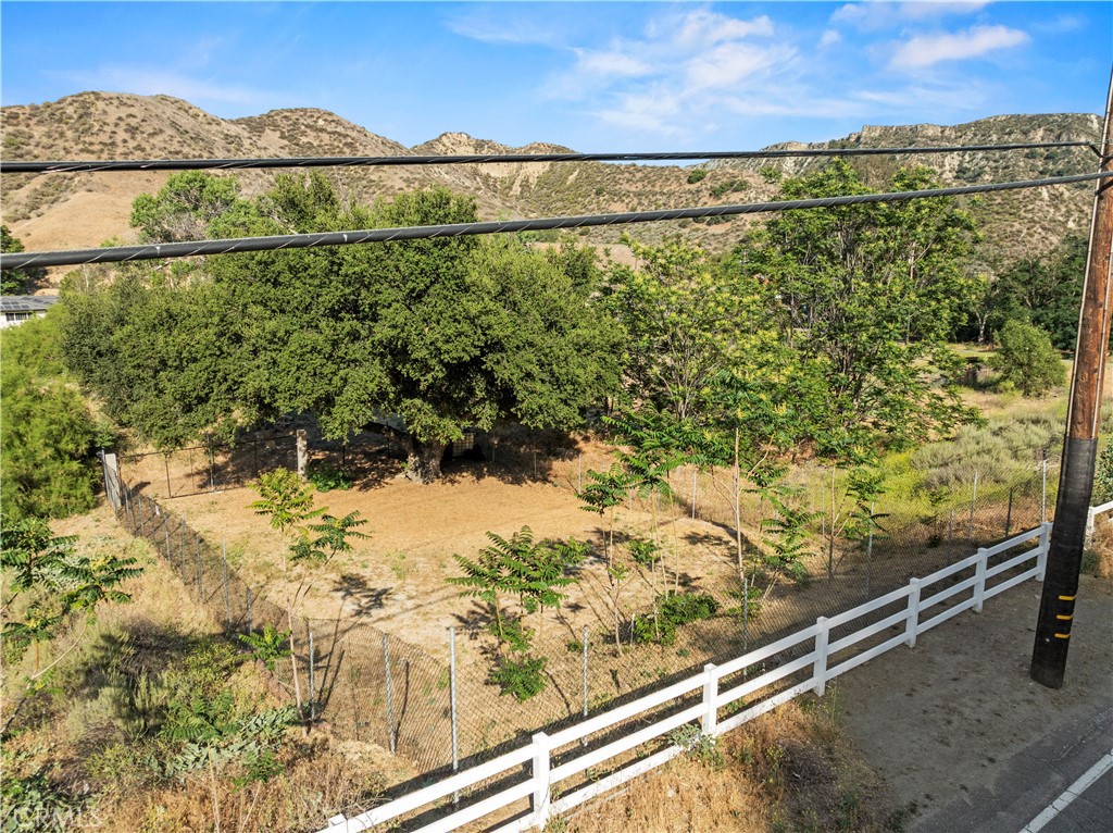 1 Taylor Street Val Verde, CA 91384 - Photo 3 of 6 a view of a lake with a mountain