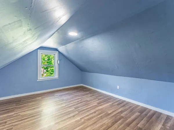 an empty room with windows
